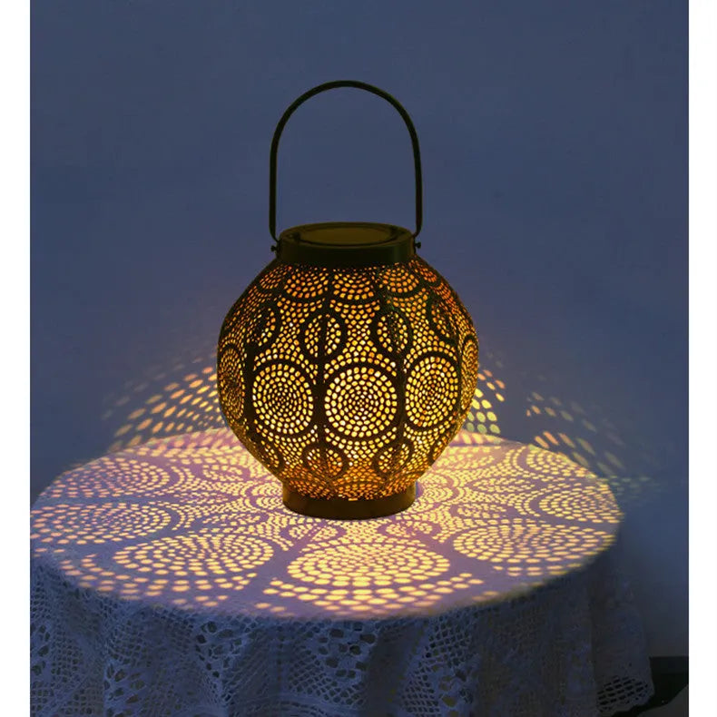 Hollow iron solar courtyard lamp with decorative design for outdoor garden lighting