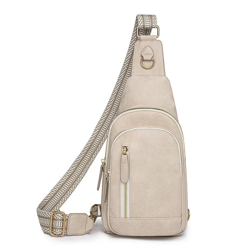 Soft PU women's crossbody bag in street-trend style with open pocket and sewing thread detail.
