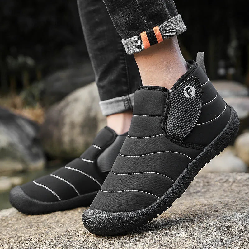 Men's thick cotton snow boots in black with a non-slip rubber sole and plush lining.