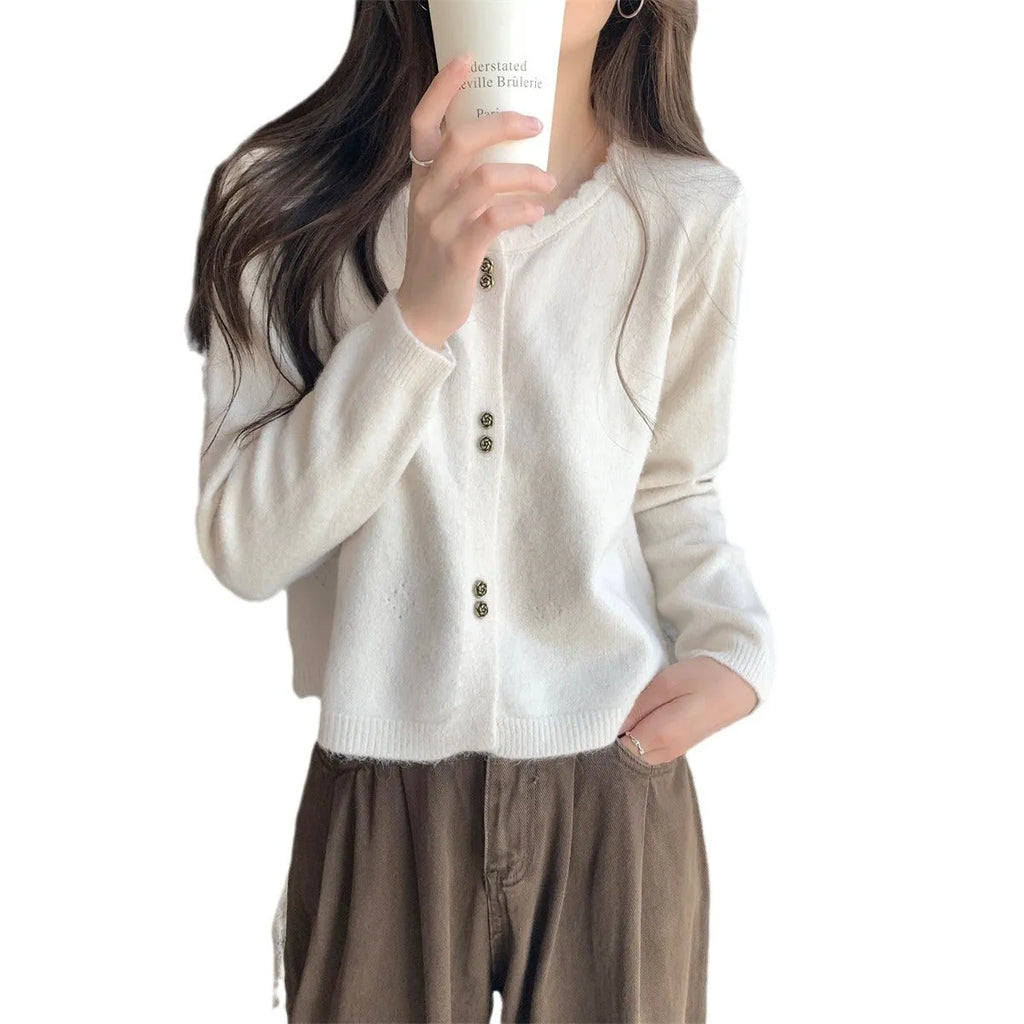 Women's long-sleeved acrylic cardigan sweater in milky white colour