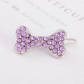 Rhinestone dog bone hair clip in alloy, shown in white, pink, blue, red and purple colour options.