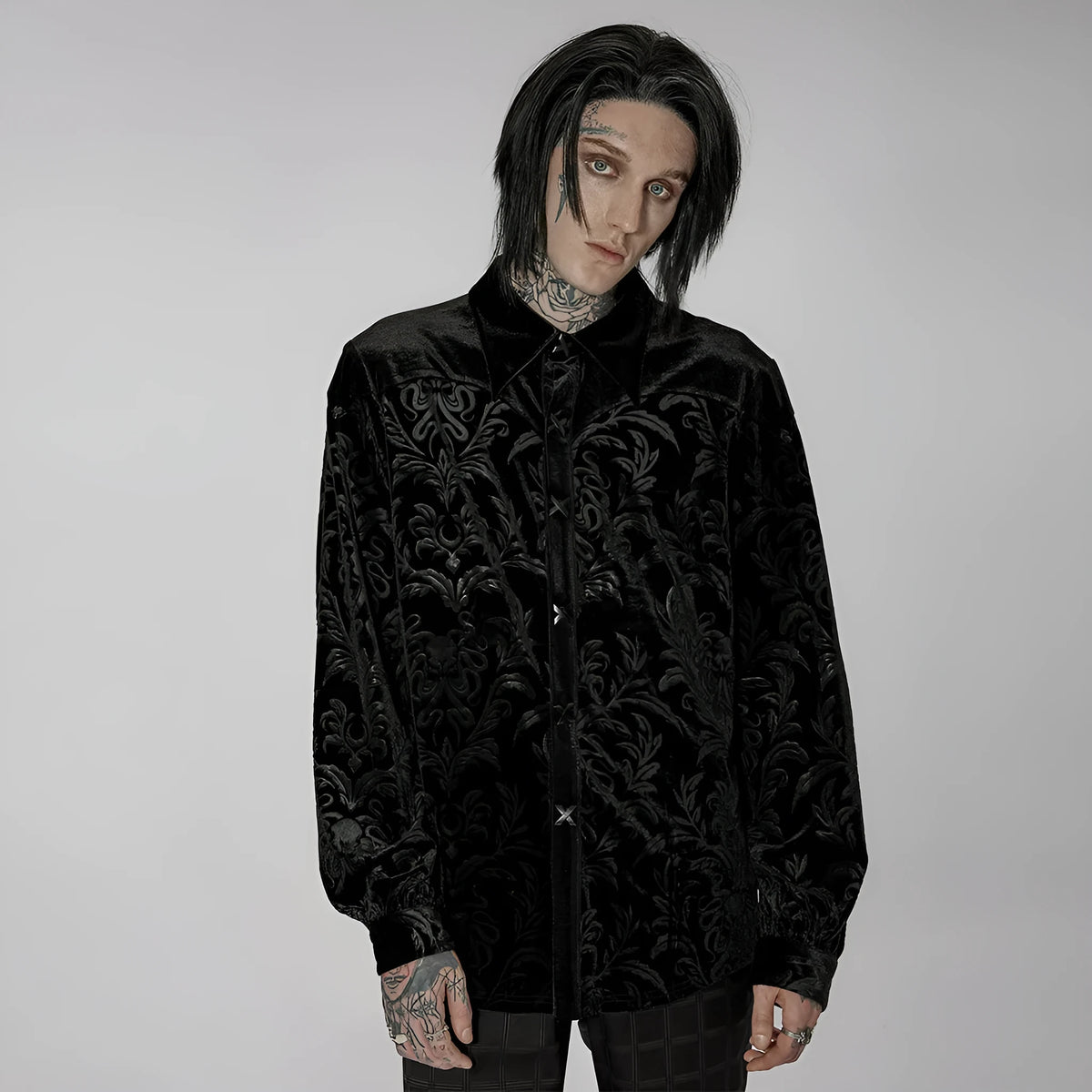 Black velvet men's shirt with pointed collar, long sleeves, and printed flocked Gothic preppy design detail.