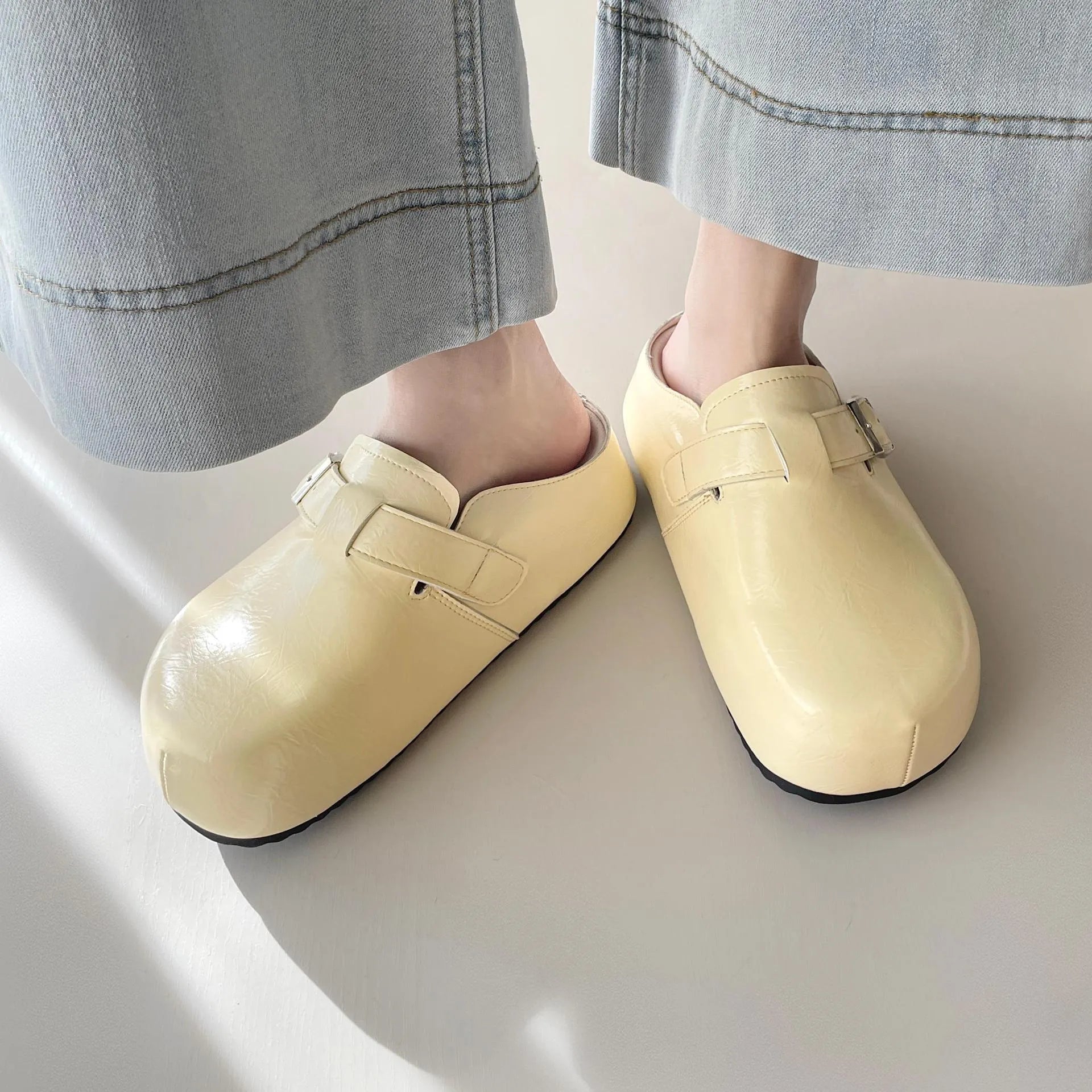 Flat buckle casual sneakers in yellow with a round toe and PU upper.