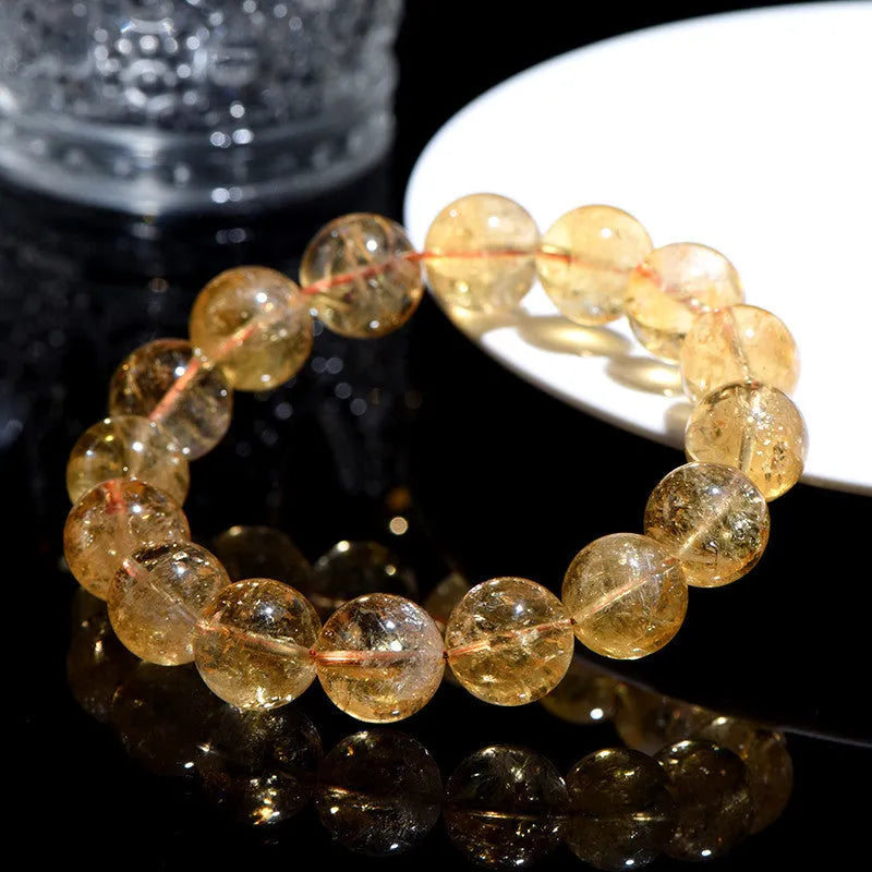 Natural yellow citrine gemstone bracelet in Asestelle design, showing single and multiple strand options.