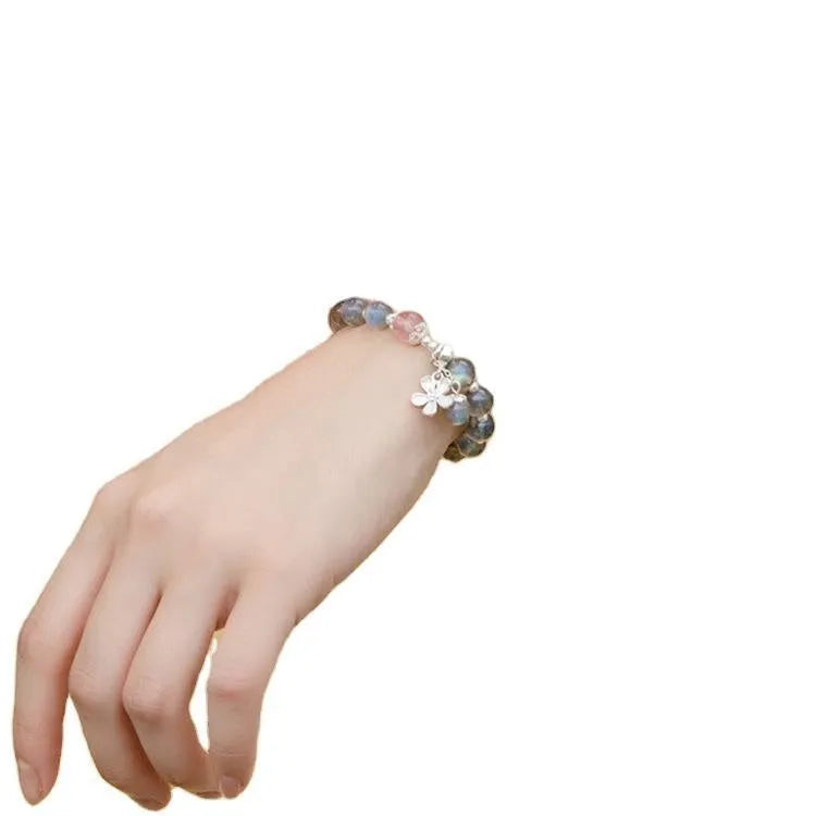 Women's crystal bracelet with grey moonlight 7.5mm beads and animal zodiac charms