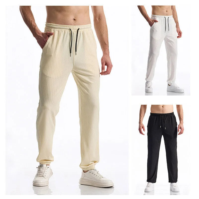 Silky rib fabric baggy straight casual trousers in black with drawstring waist and belt