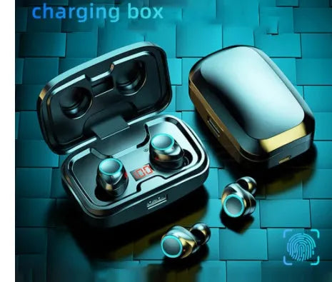 Black Bluetooth earplug-style headset with its charging case on a table