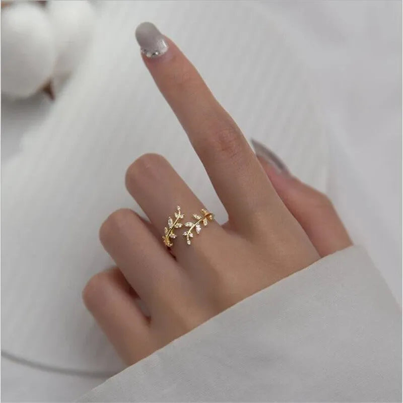 Women's geometric leaf branch ring in electroplated copper with silver or gold finish options