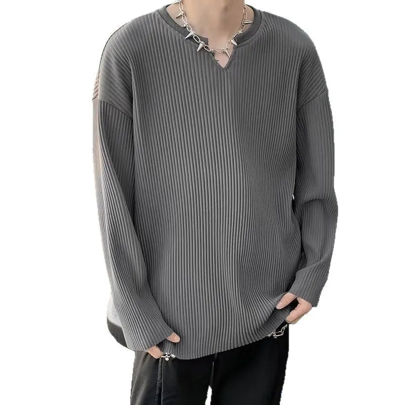Plus size striped pullover top in black with long sleeves and loose fit
