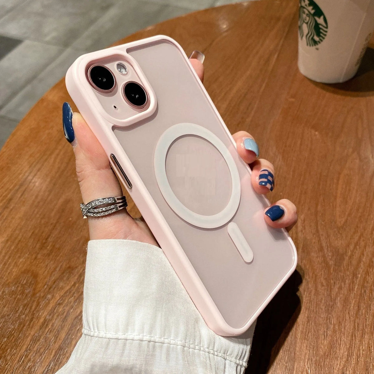Transparent acrylic MagSafe phone case showing magnetic ring, compatible with iPhone 12 and 13 models
