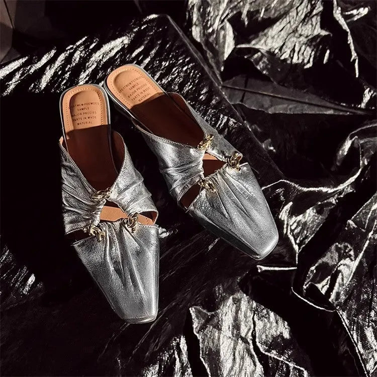 Women's gold genuine leather half toe cap slippers with low heel and square toe on a white background.