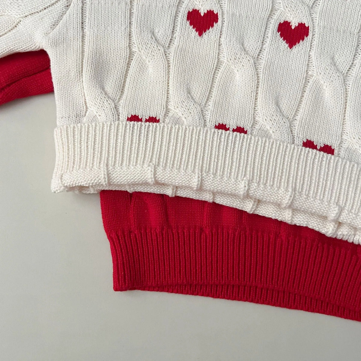 Cotton round neck pullover for baby in red colour with long sleeves on white background