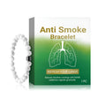 Women's smoke prevention bracelet with synthetic turquoise beads on a wrist.