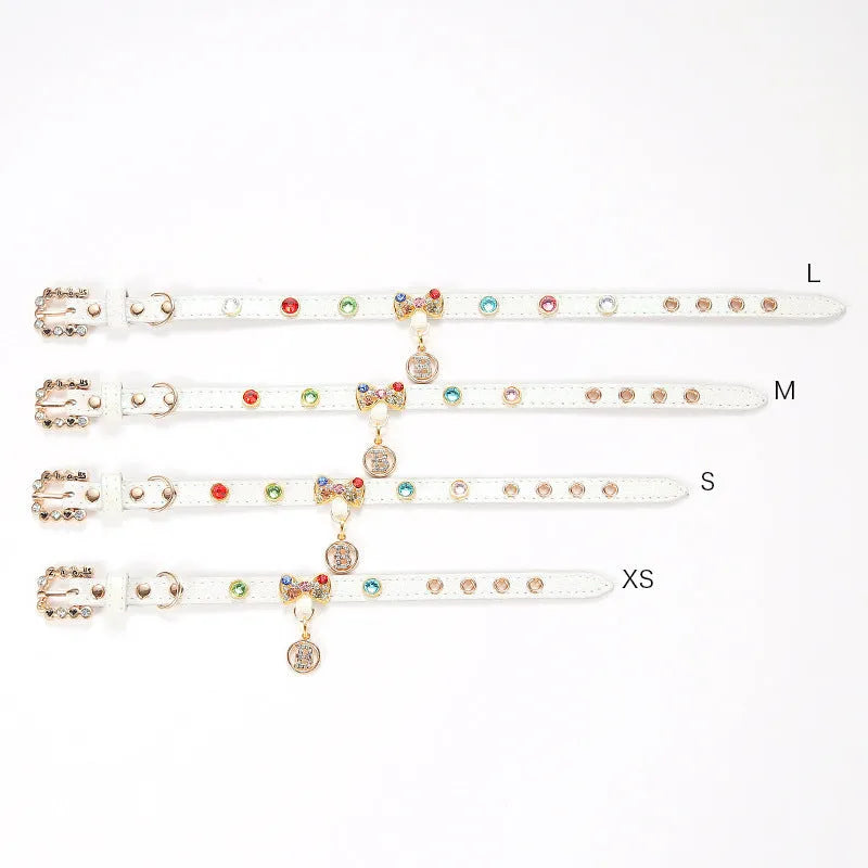 White PU cat collar with diamond alloy bow, 1.5cm wide, available in XS 26cm to L 38cm