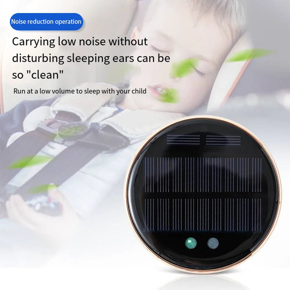 Black solar car humidifier installed in vehicle air vent showing solar panel and mist output