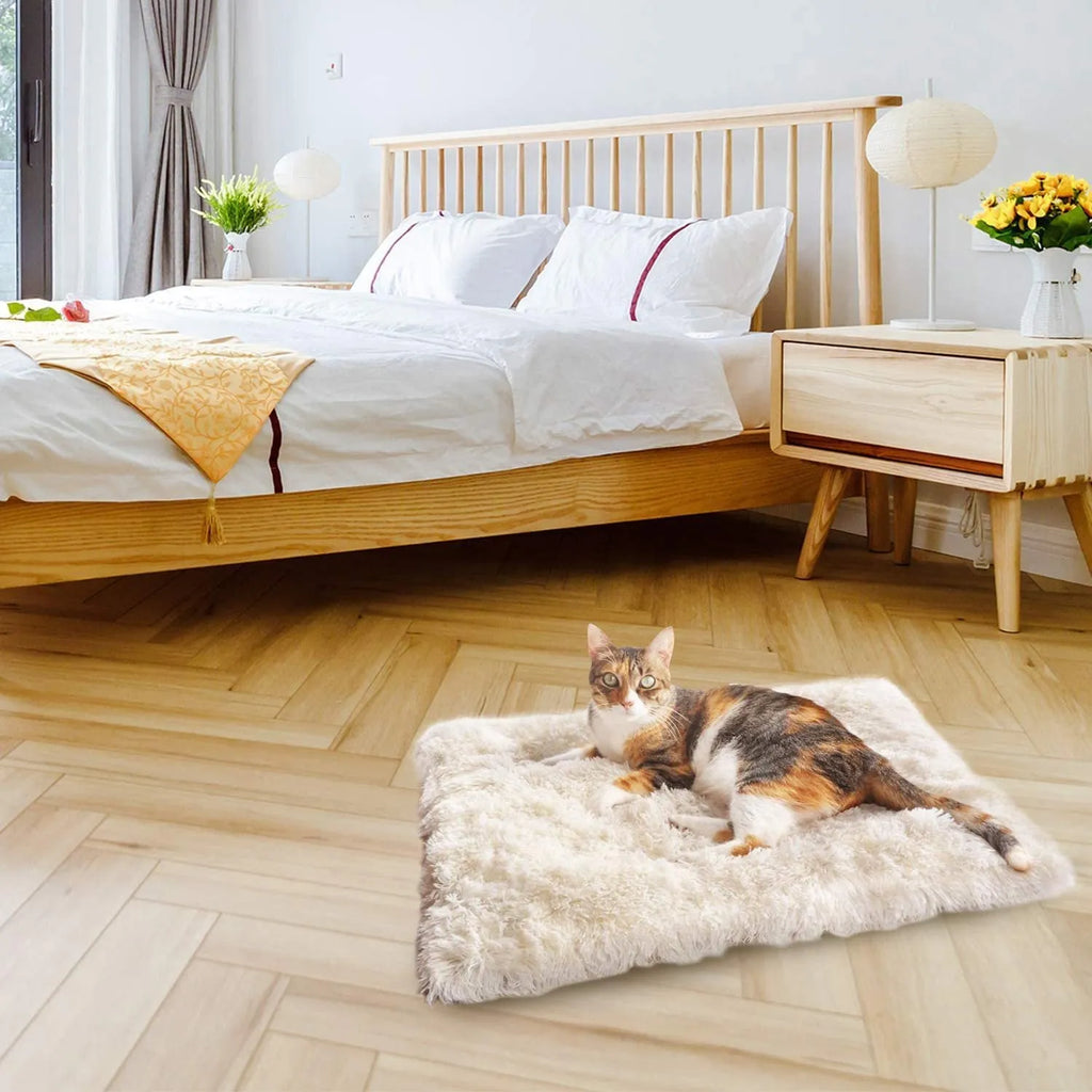 Grey pet blanket nest with fluffy surface and black non-slip base measuring 61cm by 51cm