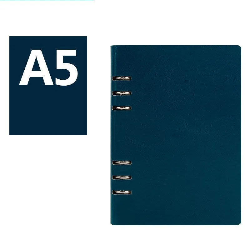 A5 loose-leaf business notebook with a black imitation leather cover, open to show beige paper.