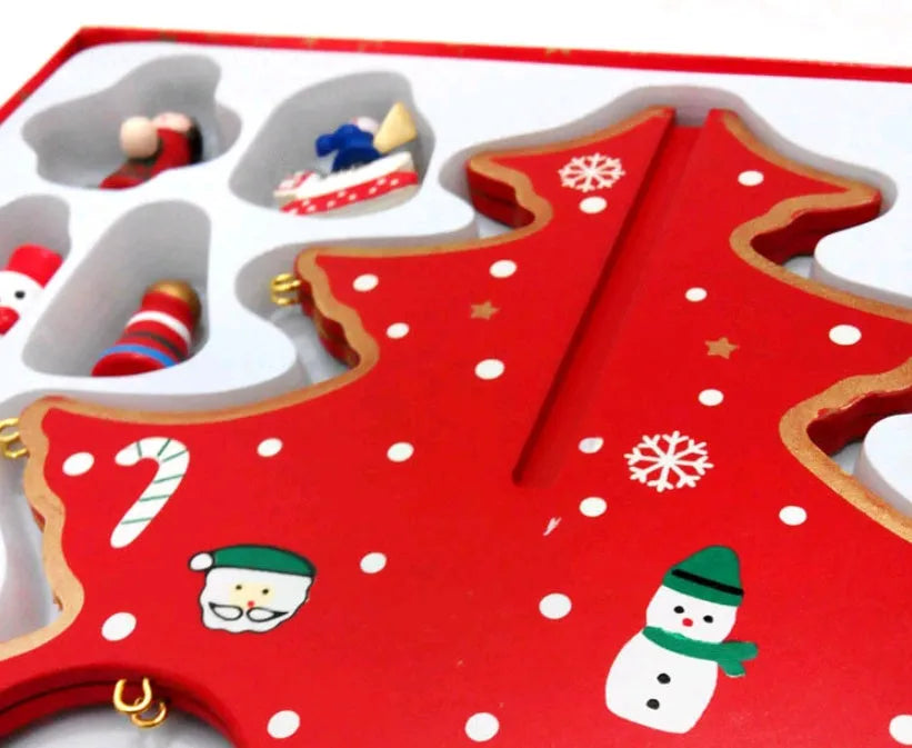Hand-painted wooden Christmas tree decoration in red and green colours for desktop display