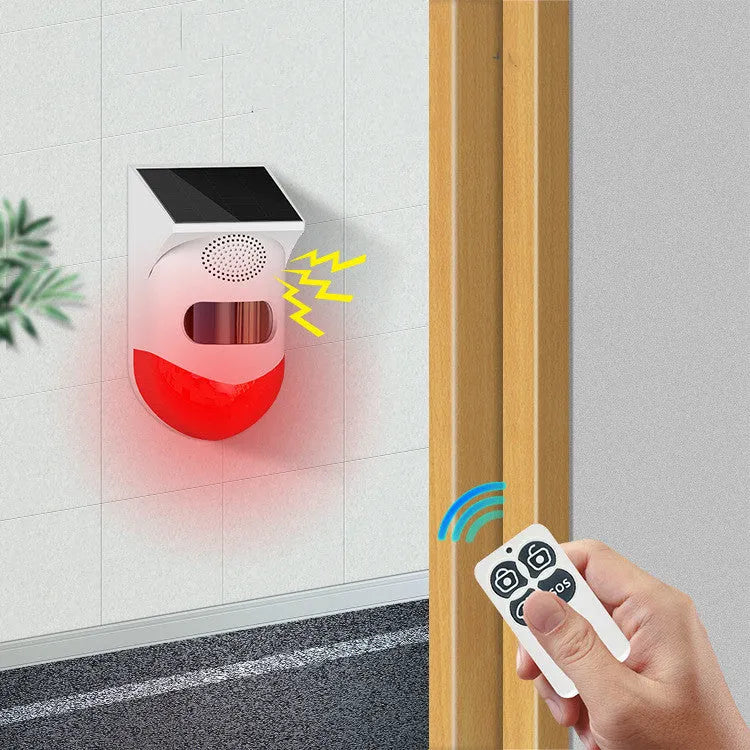 Outdoor solar-powered infrared security alarm with GSM module for wireless property monitoring.