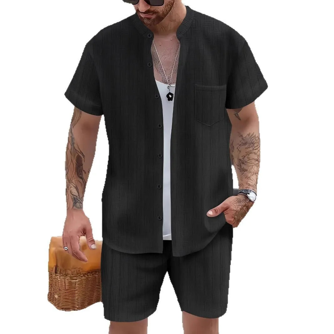 Men's Henry collar short sleeve shirt and shorts set in apricot placed on flat surface