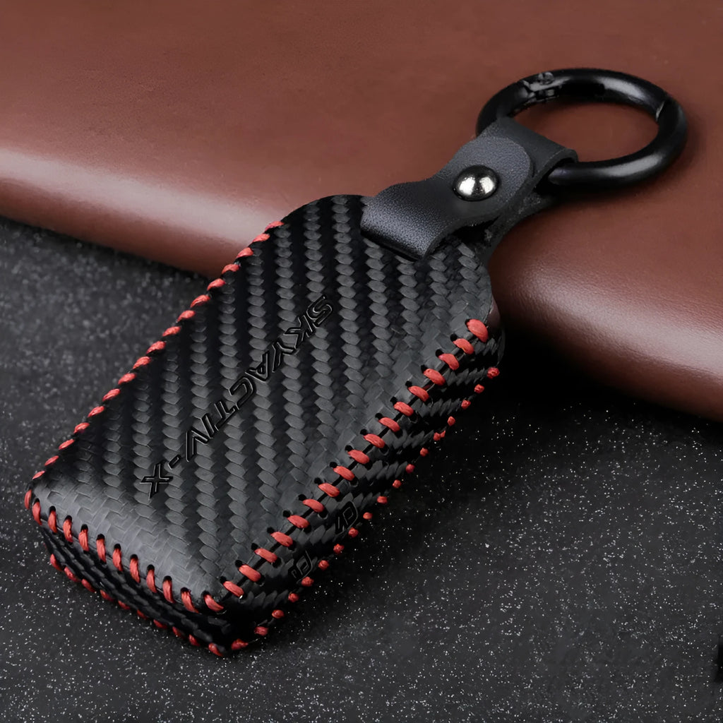 Black cow leather car key case for Angkersaila with 3D carbon fibre pattern and red line option
