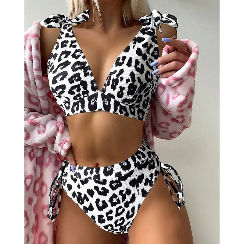 Women's purple leopard print sleeveless suit with lace-up chest detail and high-waist shorts