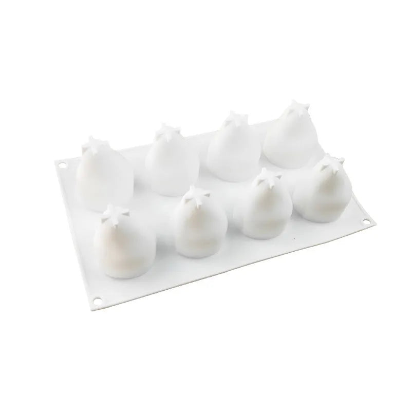 Silicone fruit baking mold showing pineapple and pine cone cavities for making mousse desserts