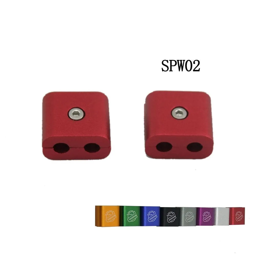 Three-piece metal car modification fastening clamp in assorted colours on a white background.