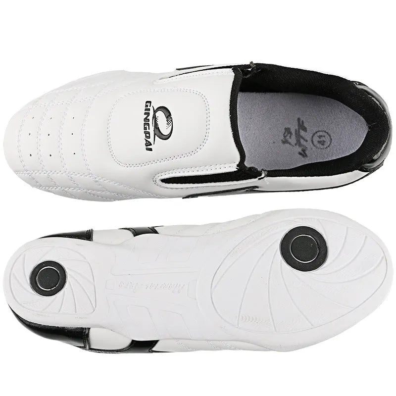 Black and white children's martial arts shoes with soft bottom and widened sole design