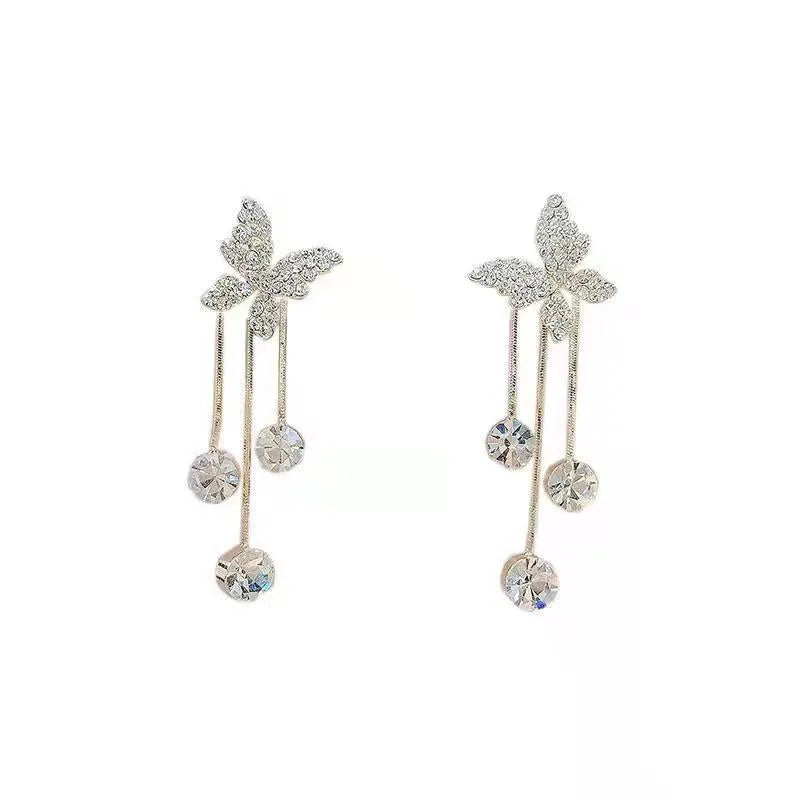 Silver butterfly rhinestone drop dangle earrings with pearl tassel chain and heart elements on alloy