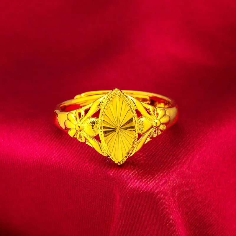 Alluvial gold open flower ring for girls featuring geometric texture and adjustable brass band
