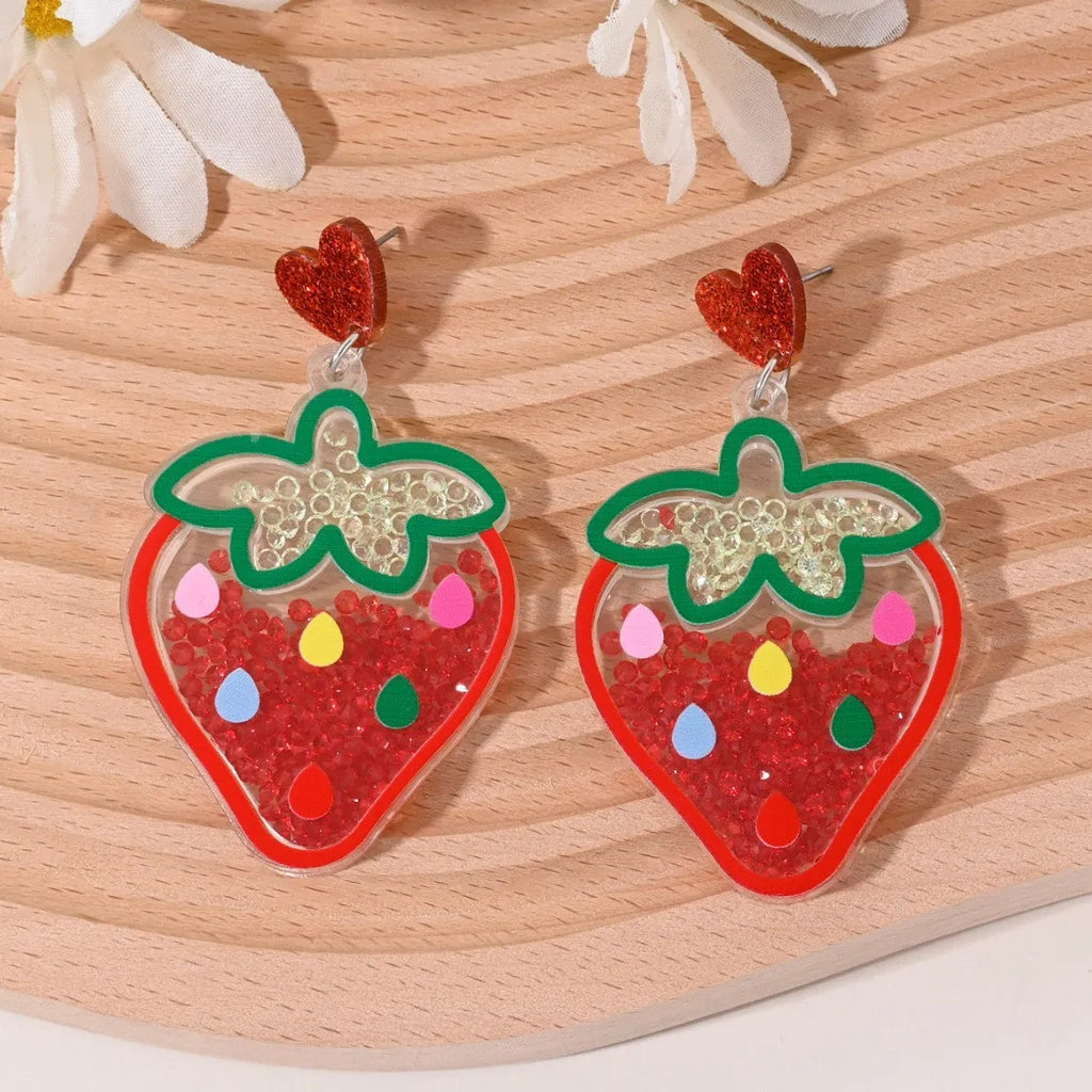Set of acrylic earrings shaped like cherry, strawberry, watermelon, pineapple, coconut, cake, and ice cream.