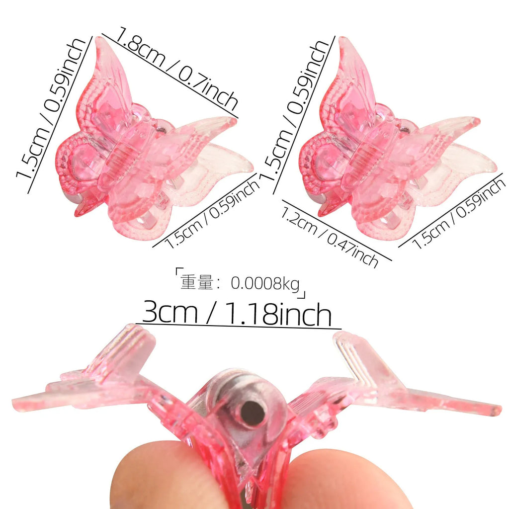 Set of 50 mini butterfly hair claw clips in assorted glitter colours on white background