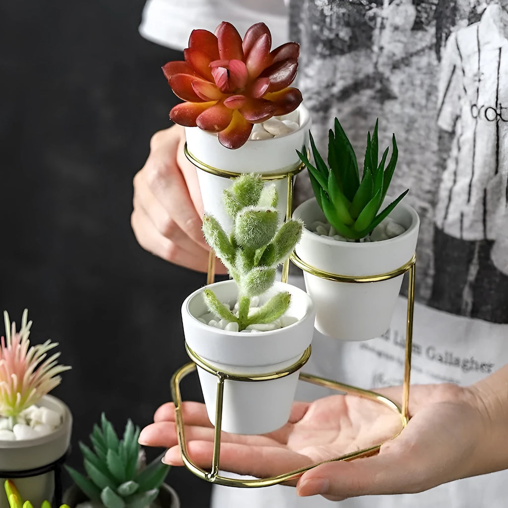 Grey pottery flower pot set with electroplated finish, shown in black grey, black white, gold grey, and gold white colour options