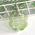 Acrylic four-leaf clover mobile phone pendant charm in blue, green, or mint colour options