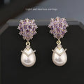 Women's drop shape pearl earrings with zircon inlay in 18K gold tone copper, silver white colour