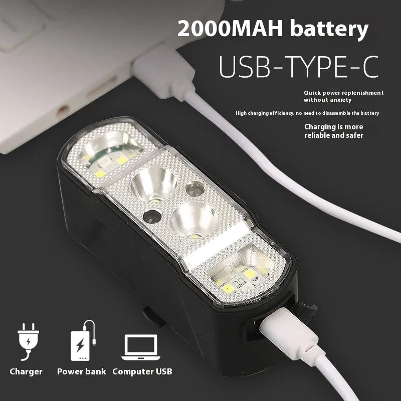 Black rechargeable bicycle headlight with LED illumination and wave induction function