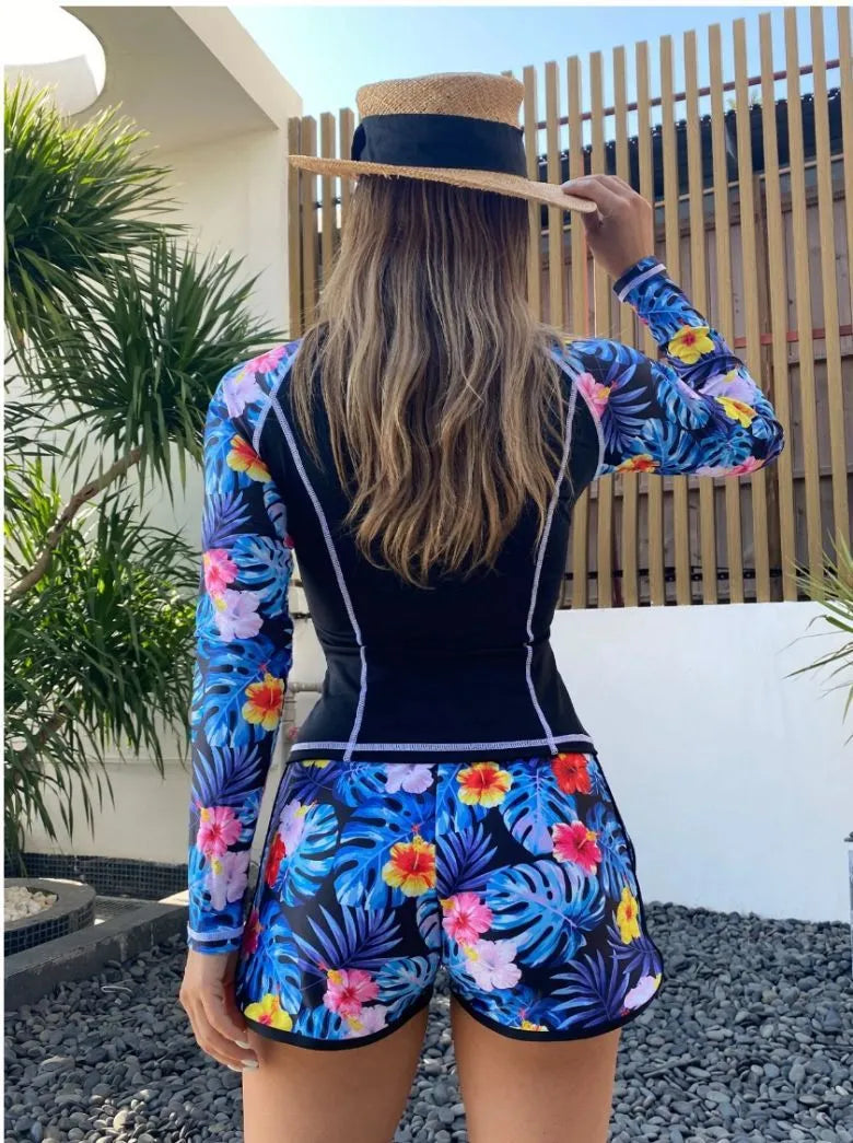 Women's long-sleeved conservative swimsuit in nylon fabric with triangle pants available in multiple colours