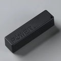 Compact white plastic power bank with wireless charging pad and built-in bracket stand