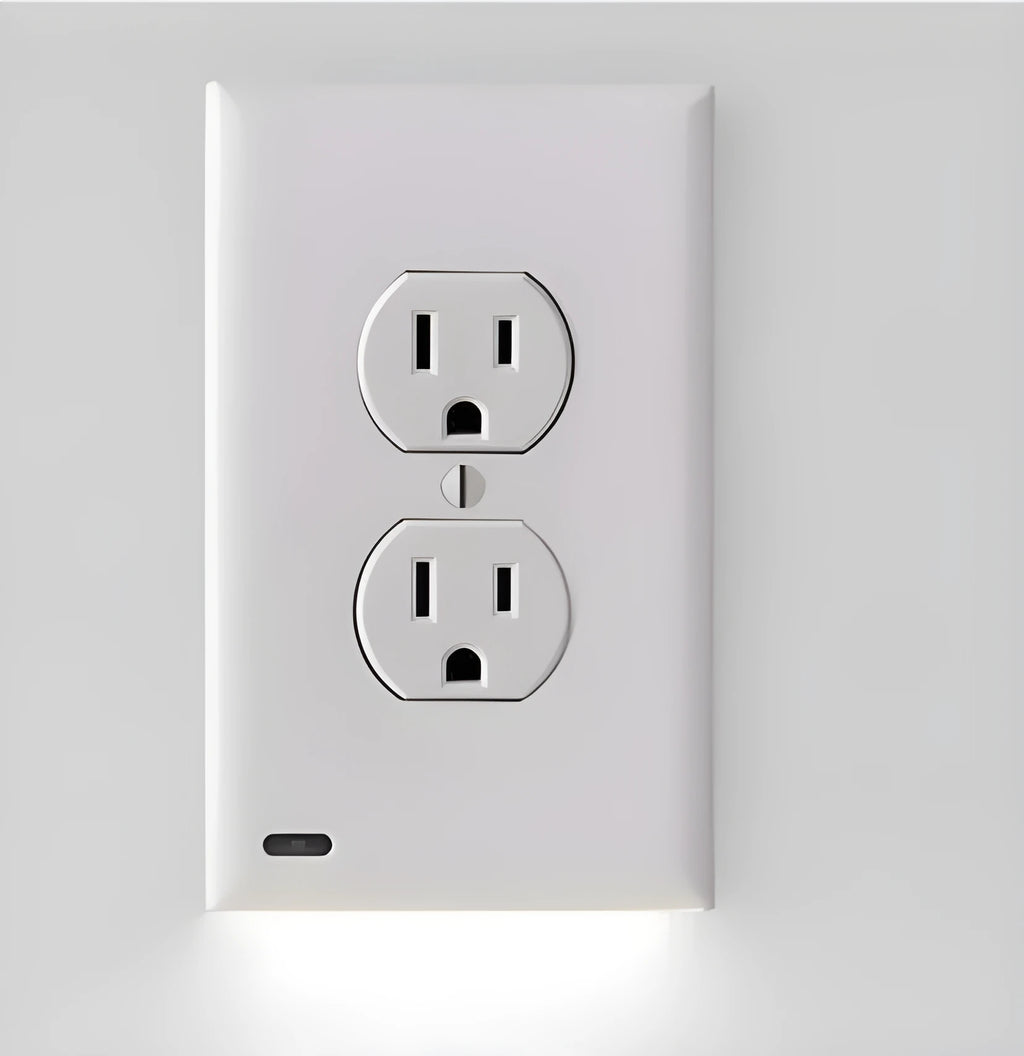 White plug-in socket induction LED night light installed on a wall outlet.