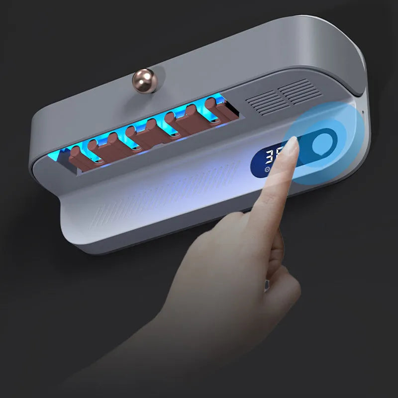 White wall-mounted smart UV toothbrush steriliser with USB charging port and button controls