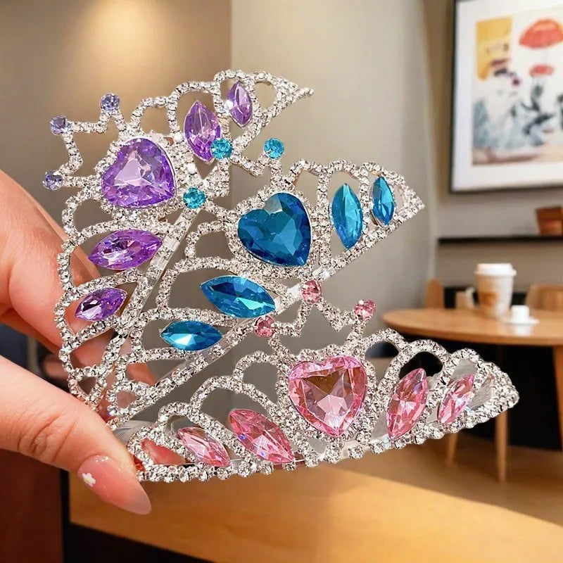 Children's metal princess crown headband with crystal stones in pink, light blue, or light purple.