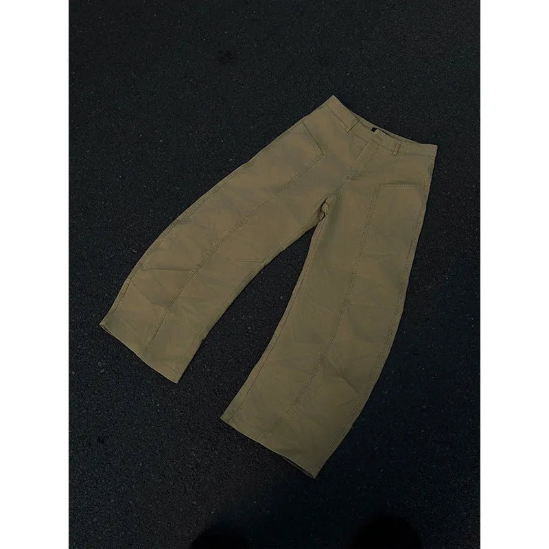 Men's khaki cotton trousers with straight leg cut and American retro styling on hanger