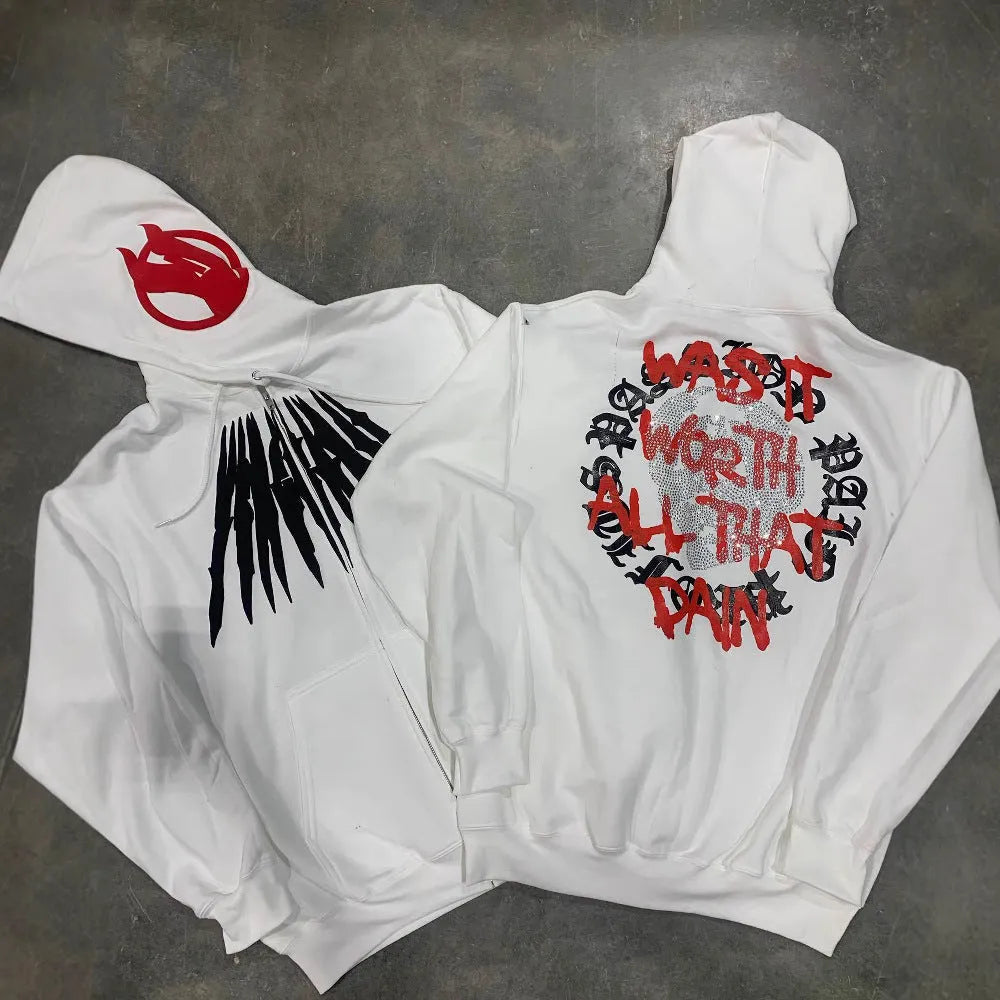 Black hooded sweatshirt with white skull pattern and rhinestone detailing