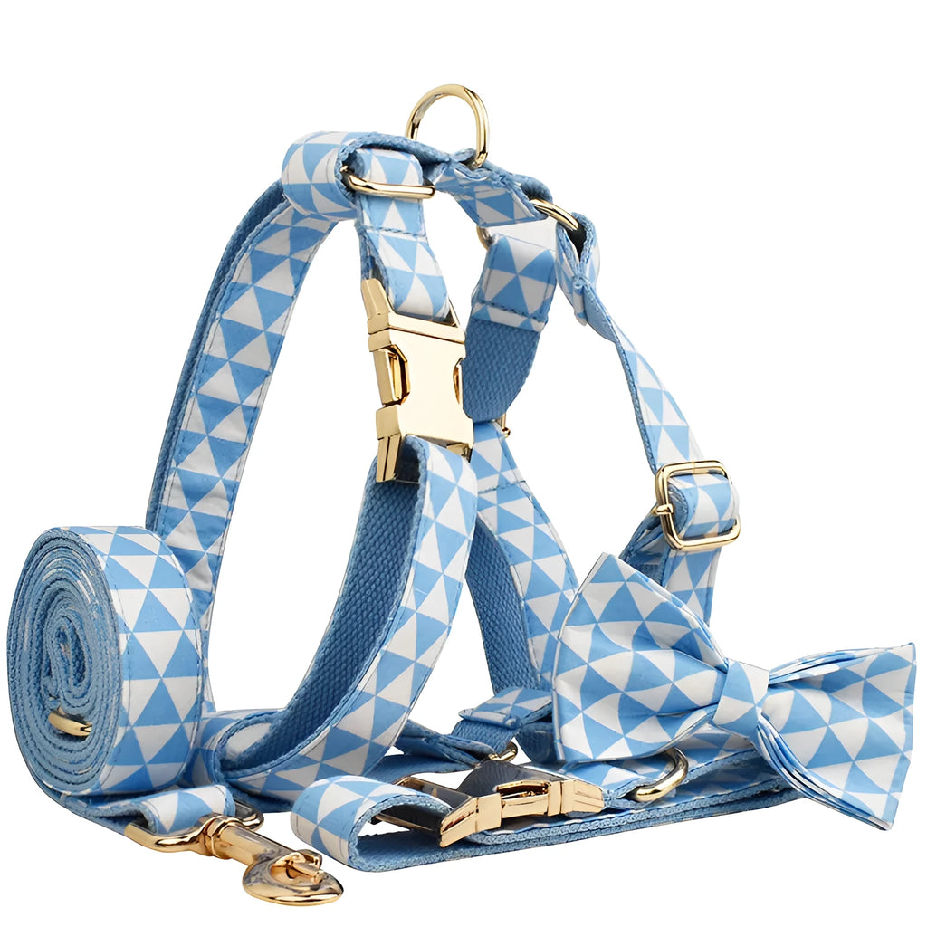 Blue four-piece dog set with collar, leash, bow, and vest in cloth material