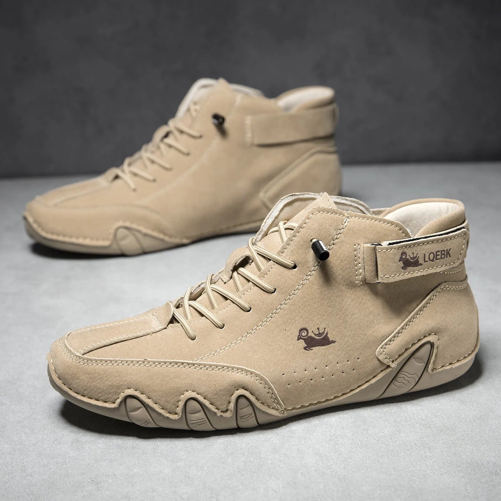 Men's brown high-top Martin boots with round toe and flat rubber sole on a white background.