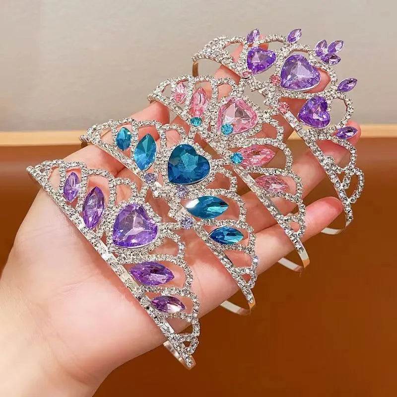Children's metal princess crown headband with crystal stones in pink, light blue, or light purple.