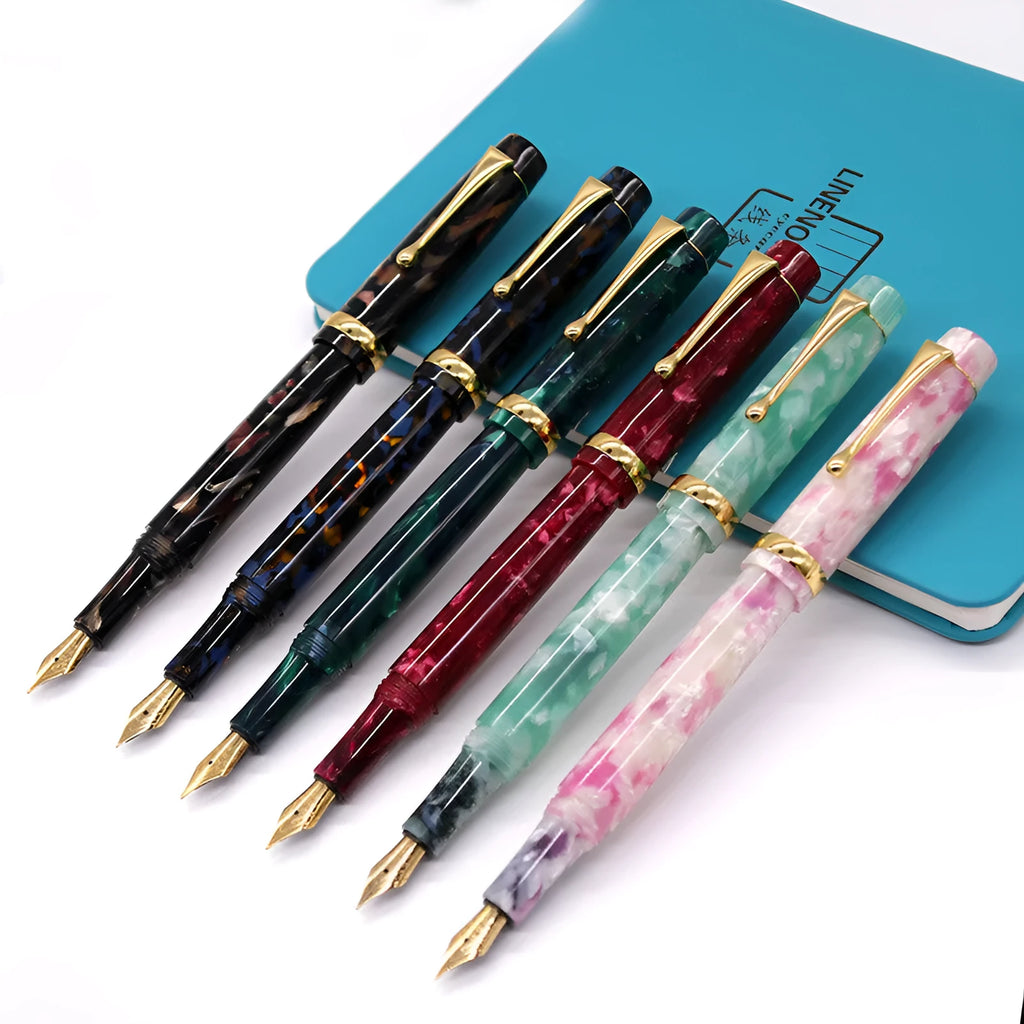 Acrylic fountain pen in multiple colours including black, blue, green, pink, and red