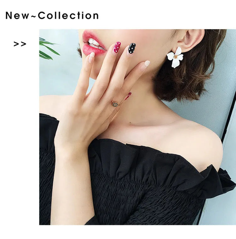Flower design stud earrings for women in white or pink electroplated finish