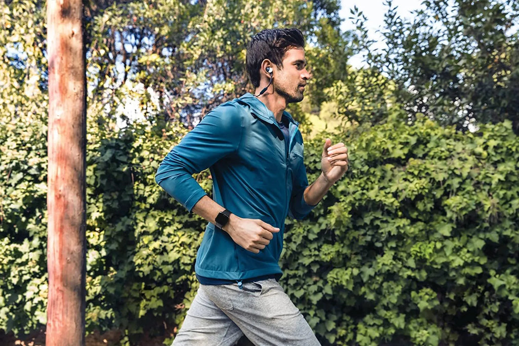 Black waterproof smart watch with heart rate monitor and sleep tracker on a silicone strap.